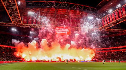 Flares and fireworks set off at the Johan Cruyff Arena in Amsterdam
