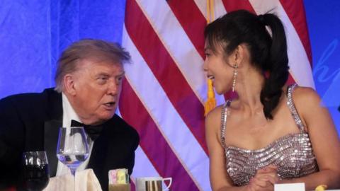 Trump speaks to CBS News senior White House correspondent and White House Correspondents' Association President (WHCA) Weijia Jiang at the WHCA Dinner
