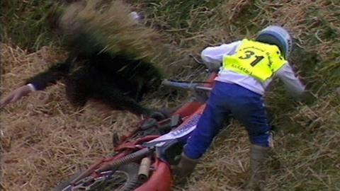  First-aiders falls as he tries to help young motorbike rider