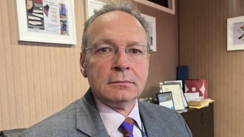 Principal Andrew Cropley in room