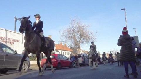 Horses and riders from the Grove and Rufford Hunt setting off on the Boxing Day hunt on 26 December 2025 along Bawtry High Street near Doncaster.