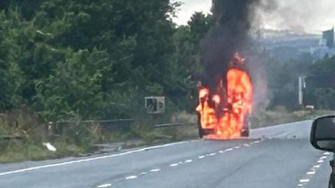 Crane on fire on A38 Plymouth