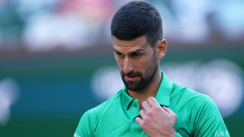 Novak Djokovic reacts during his iNdian Wells defeat by Botic van de Zandschulp