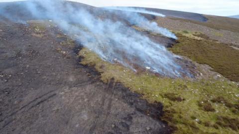 Teine air Mòinteach Dhamhath