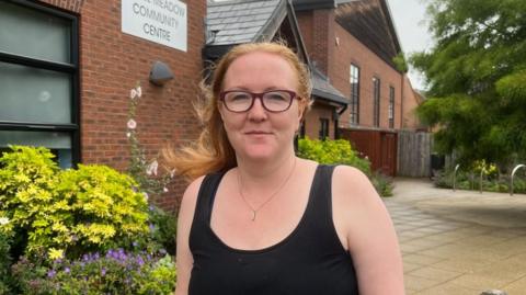 Jo Whitten stood in front of the entrance of the Chase Meadow Community Centre.