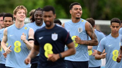 England players jogging in training