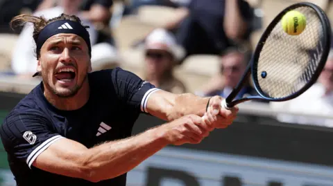 Alexander Zverev hits a backhand