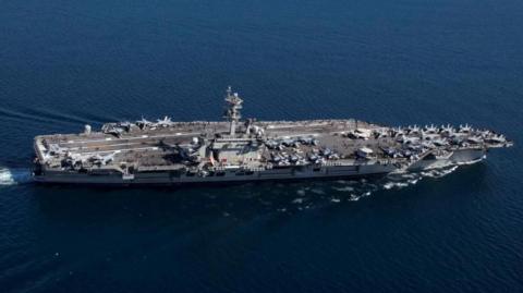 The USS Abraham Lincoln sailing in the sea