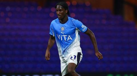 Jid Okeke in action for Stockport in the Carabao Cup this season against Crewe