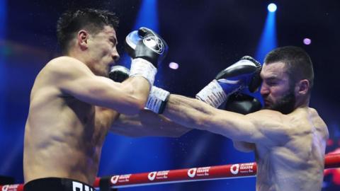 Dmitry Bivol and Artur Beterbiev punch each other at the same time