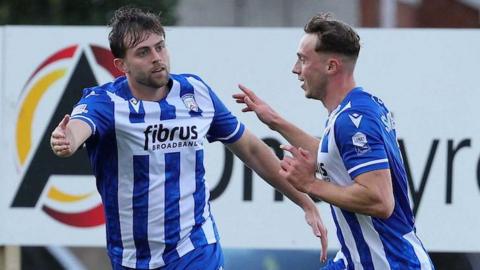 Coleraine goalscorer Matthew Shevlin is congratulated