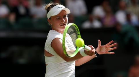 Barbora Krejcikova hits a forehand