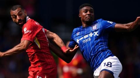 Ben Johnson in action for Ipswich against Liverpool