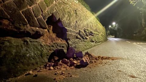 A photo showing debris after the wall collapse