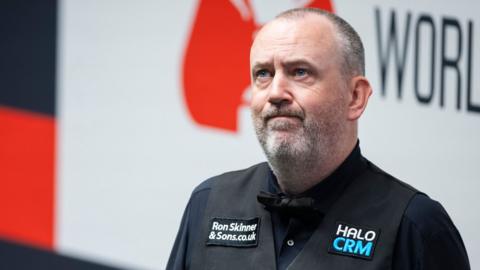 Mark Williams looks upwards