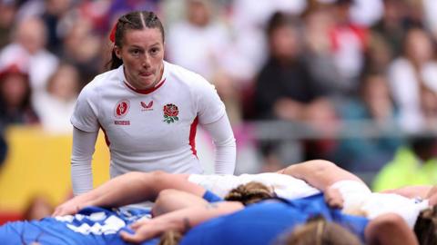 Lucy Packer in action for England against France in the 2025 World Cup semi-final.