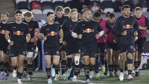 Newcastle Red Bulls players warming up before the Saracens game
