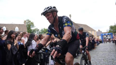 Lewis Moody after arriving at his former school, Oakham School in Rutland, on day three of the Lewis Moody XV Cycle Challenge