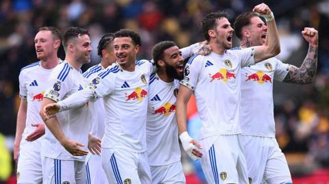 Leeds United players celebrate a goal against Wolverhampton Wanderers in the Premier League