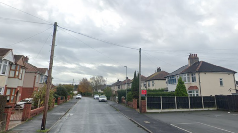 Thorntrees Avenue in Lea, Preston, a street lined with 1930s semi-detached houses, on an overcast day.