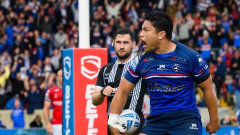 Mason Lino celebrates his try for Wakefield Trinity against Hull KR