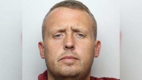 Police custody picture of Garry Sinclair