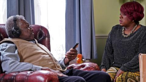 Patrick Trueman (RUDOLPH WALKER) and Kim Fox (TAMEKA EMPSON)