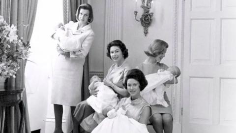 Queen Elizabeth II, Princess Margaret, Princess Alexandra and The Duchess of Kent hold their babies