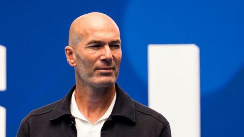Zinedine Zidane looking on