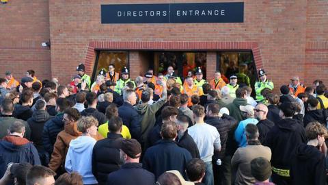 Norwich City fans protesting outside the directors' entrance at Carrow Road