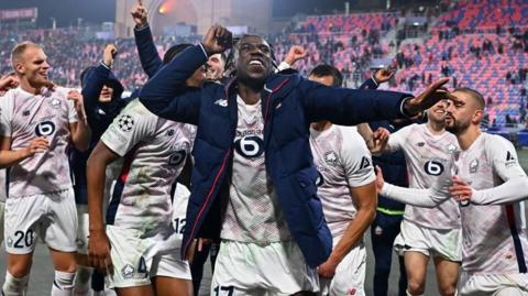 Lille players celebrate