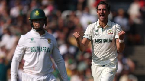Mitchell Starc celebrates a wicket