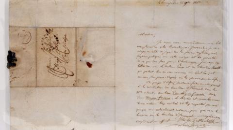 Lucien Bonaparte’s letter which sold for £500. The letter is light brown with handwriting and some of the words are underlined.