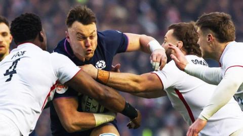Scotland's Jack Dempsey in action against England