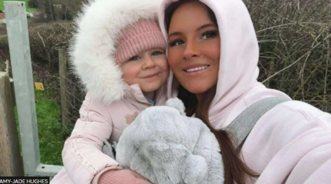 A woman and a toddler both wearing pink