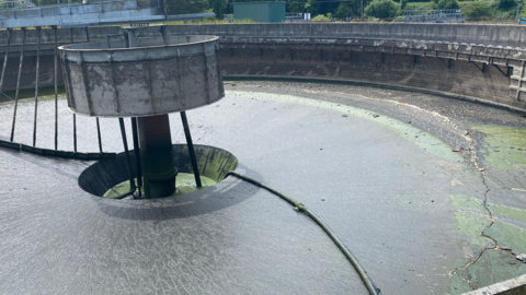 A crack stretches across a storm tank.