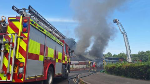 Firefighters at the scene of the blaze