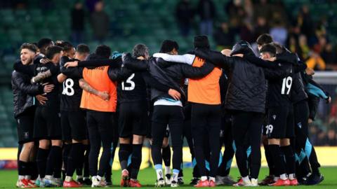 Sheffield Wednesday in a huddle after Norwich win