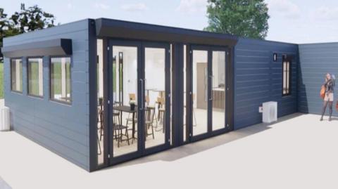 A digitally created image of a dark blue building. It has large glass doors on the front with windows down the side. It is a single story building, two trees are in the background and a person appears on the right of the image.