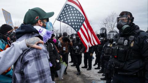 Minneapolis Police Department officers face off with protesters during an anti-ICE protest outside of the Whipple Federal Building in Fort Snelling, Minnesota, USA, 15 January 2026. 