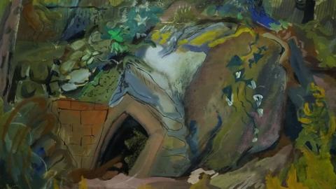 A close up of an impressionistic landscape, painted in varies shades of green and flashes of yellow. It shows a hillside, part held up by a brick wall, and a dark opening into the hill. 