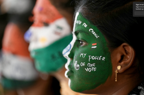 College students with painted faces spread awareness for first generation voters during an election campaign ahead of India's upcoming national elections in Chennai on March 19, 2024. (Photo by R. Satish BABU / AFP) (Photo by R. SATISH BABU/AFP via Getty Images)