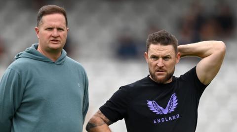 Rob Key and Brendon McCullum stand beside each other