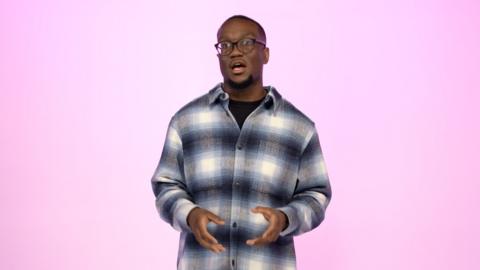 Sage Todz in a chequered shirt