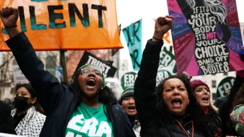 Protestors representing a variety of rights groups join the "People's March on Washington" 