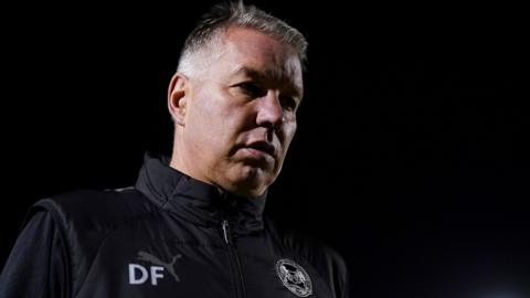 Peterborough manager Darren Ferguson leaves the pitch following their midweek defeat at Northampton Town.