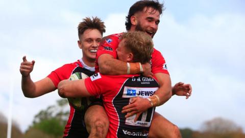 Cornish Pirates players celebrate a try