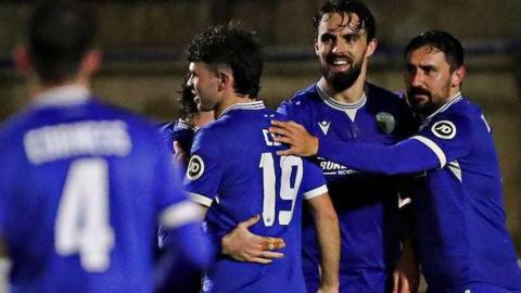 Jordan Williams celebrates with team-mates