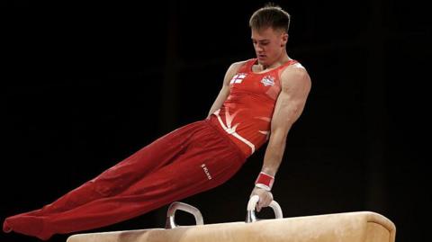 England gymnast Luke Whitehouse on the pommel horse