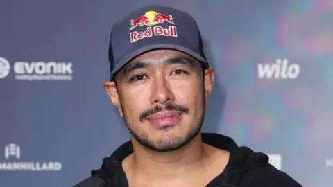 Close up photo of renowned Nepali mountaineer Nirmal Purja